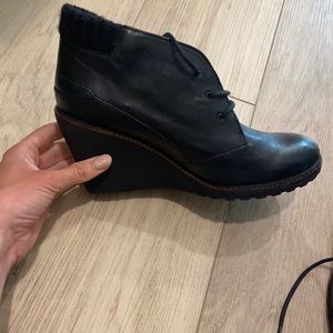 Lacoste black wedge booties. Never worn!